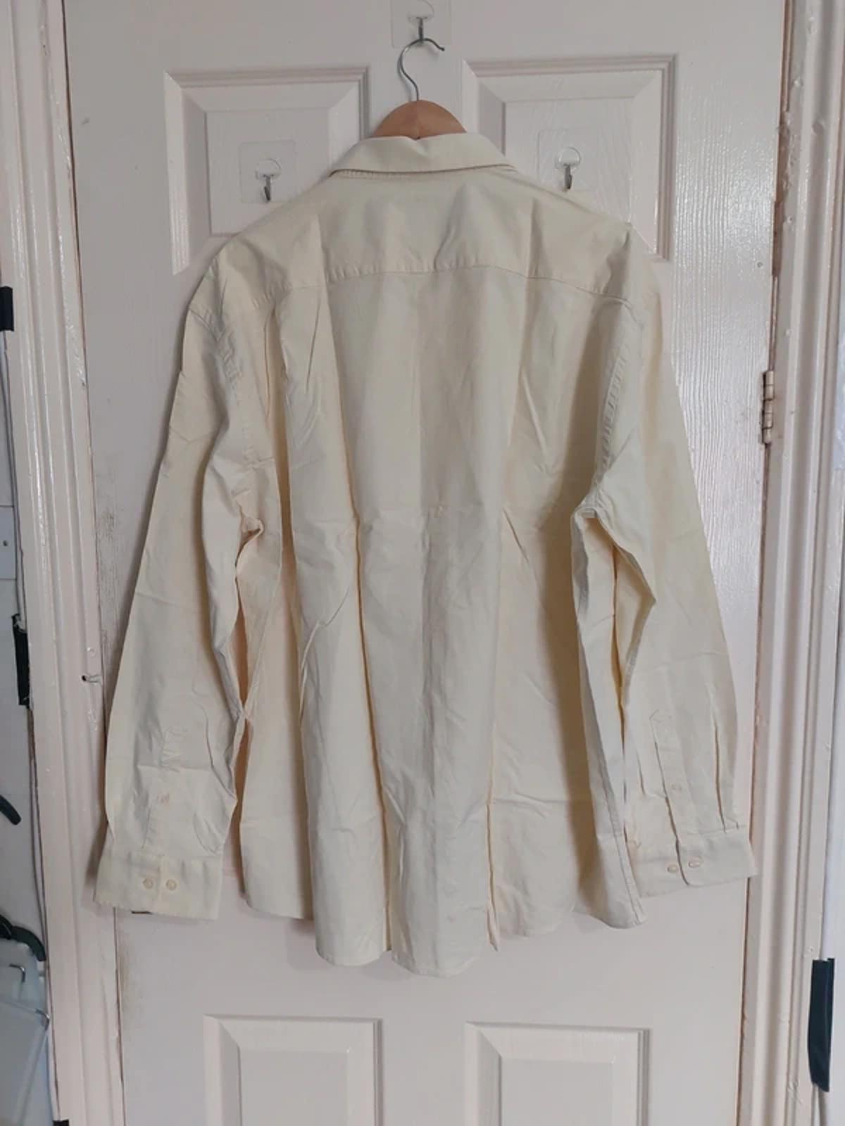Pale yellow shirt