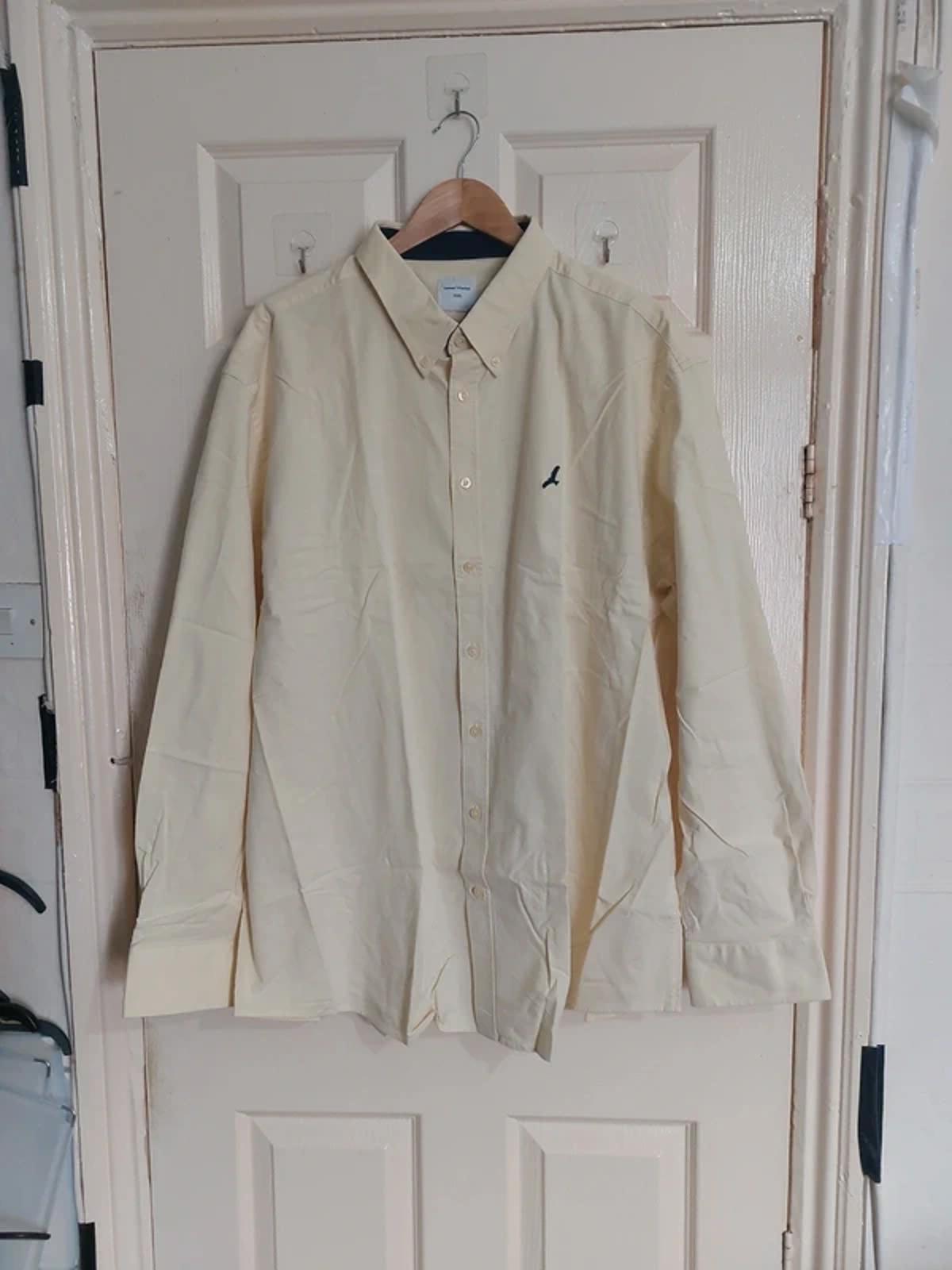 Pale yellow shirt