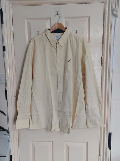 Pale yellow shirt