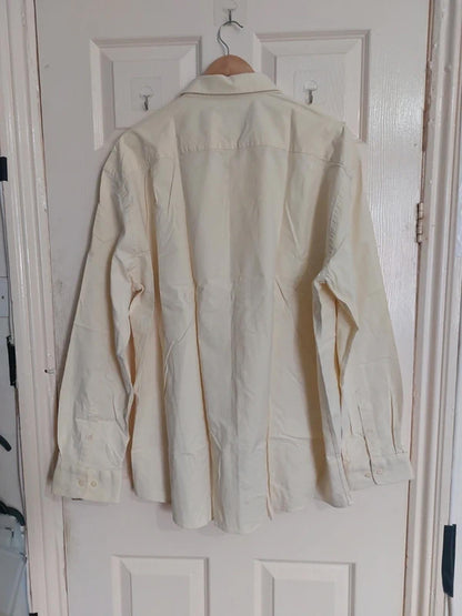 Pale yellow shirt