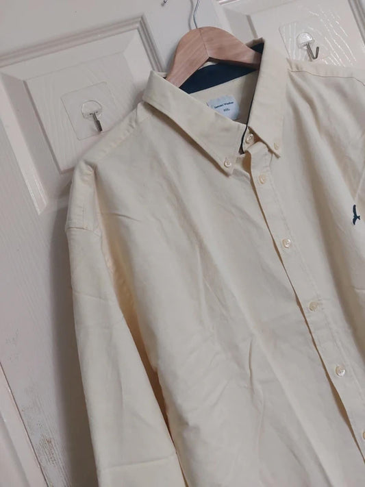 Pale yellow shirt